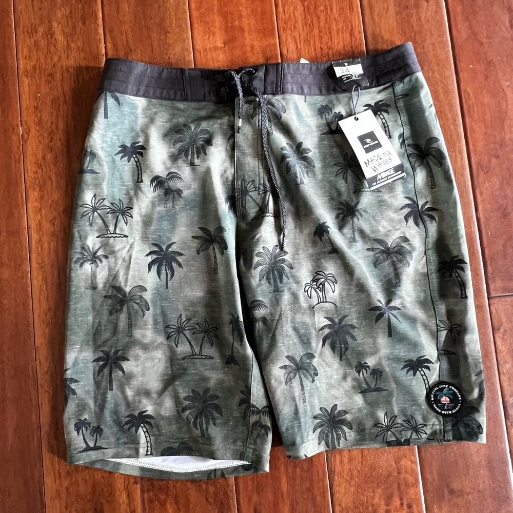 NWT- Rip Curl - Mirage Green and Black Board Shorts with Tropical Design